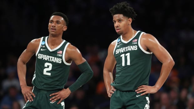 Michigan State guards Tyson Walker and A.J. Hoggard.